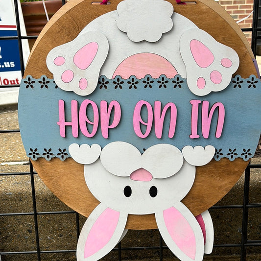 Hop on in door sign