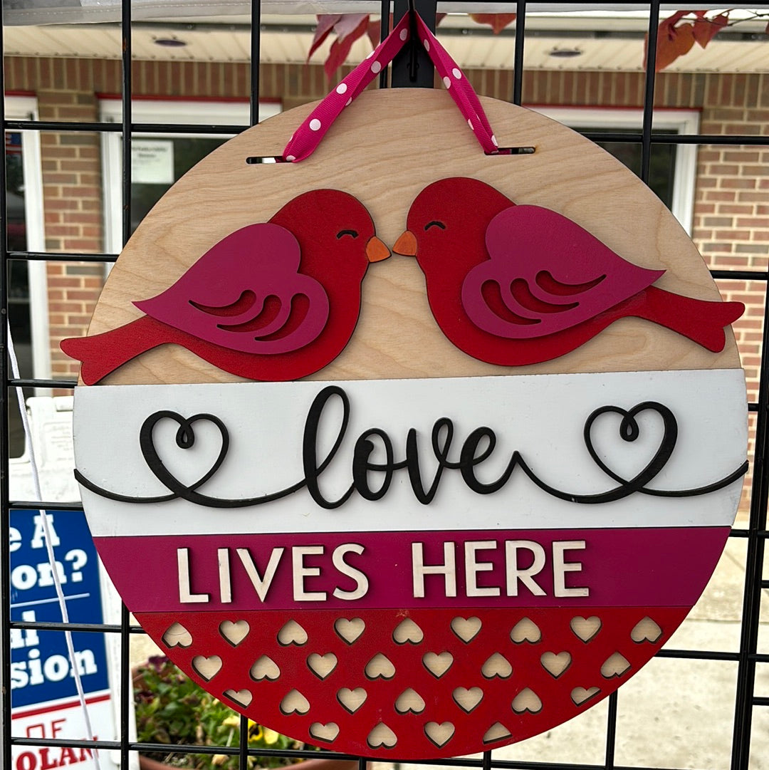 Love lives here door sign